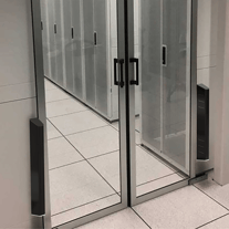 Door Detective SG with Sidegate Detection securing a wide double-door entrance against side-by-side collusion
