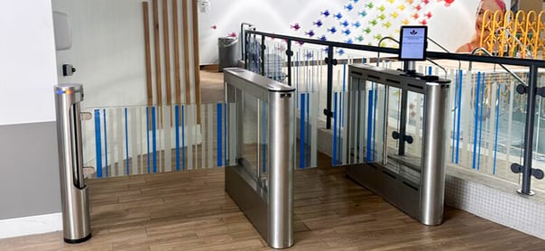 Fastlane turnstile pedestal with integrated biometric credentialing for touchless access control