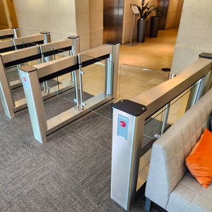 Energy-efficient Fastlane turnstiles operating at 60 watts per lane in a sustainable building lobby